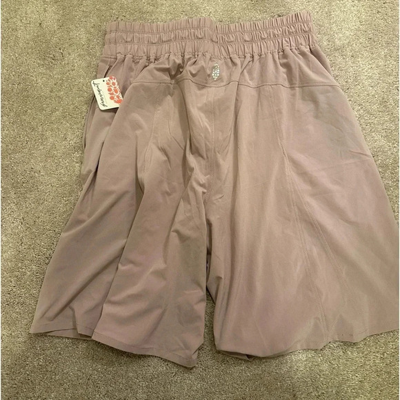 Free People Movement Bring your game longline shorts Medium BNWT - Picture 3 of 3